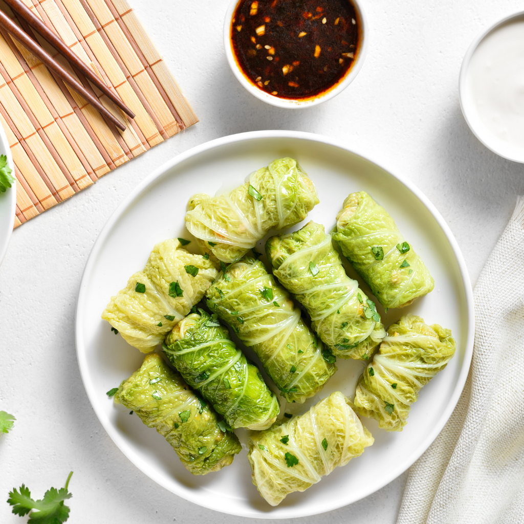 Kalua Pork Stuffed Cabbage Rolls with Garlic-Shoyu Butter Glaze